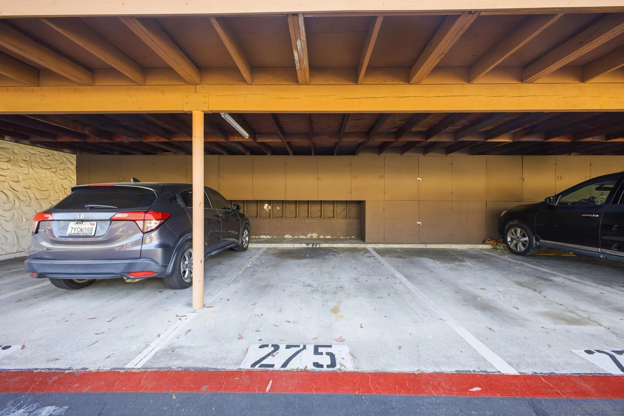 6019 Rancho Mission Road, Unit 204 San Diego, CA 92108 - Photo 26 of 38 Dedicated covered parking spot and storage locker