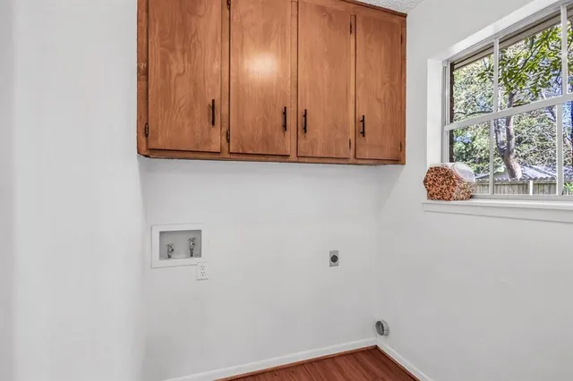 a view of door with wooden wall