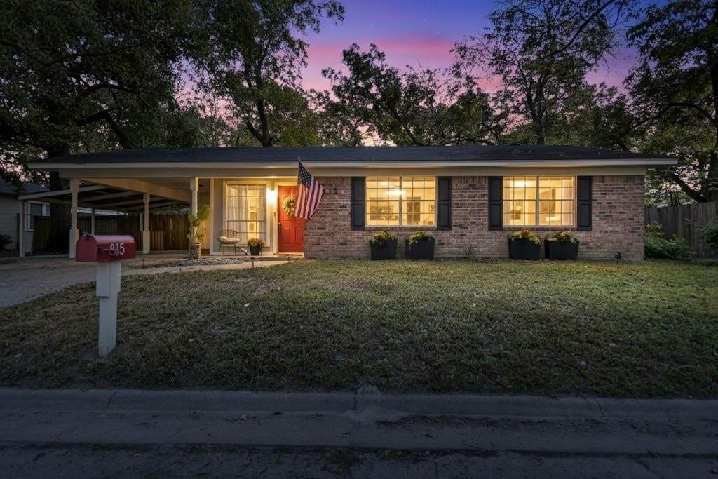 815 North Bledsoe Street Gilmer, TX 75644 - Photo 3 of 26 a front view of house with yard and green space