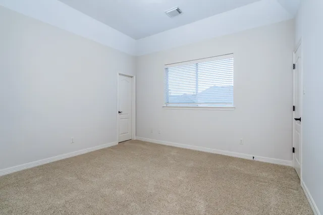 an empty room with a window