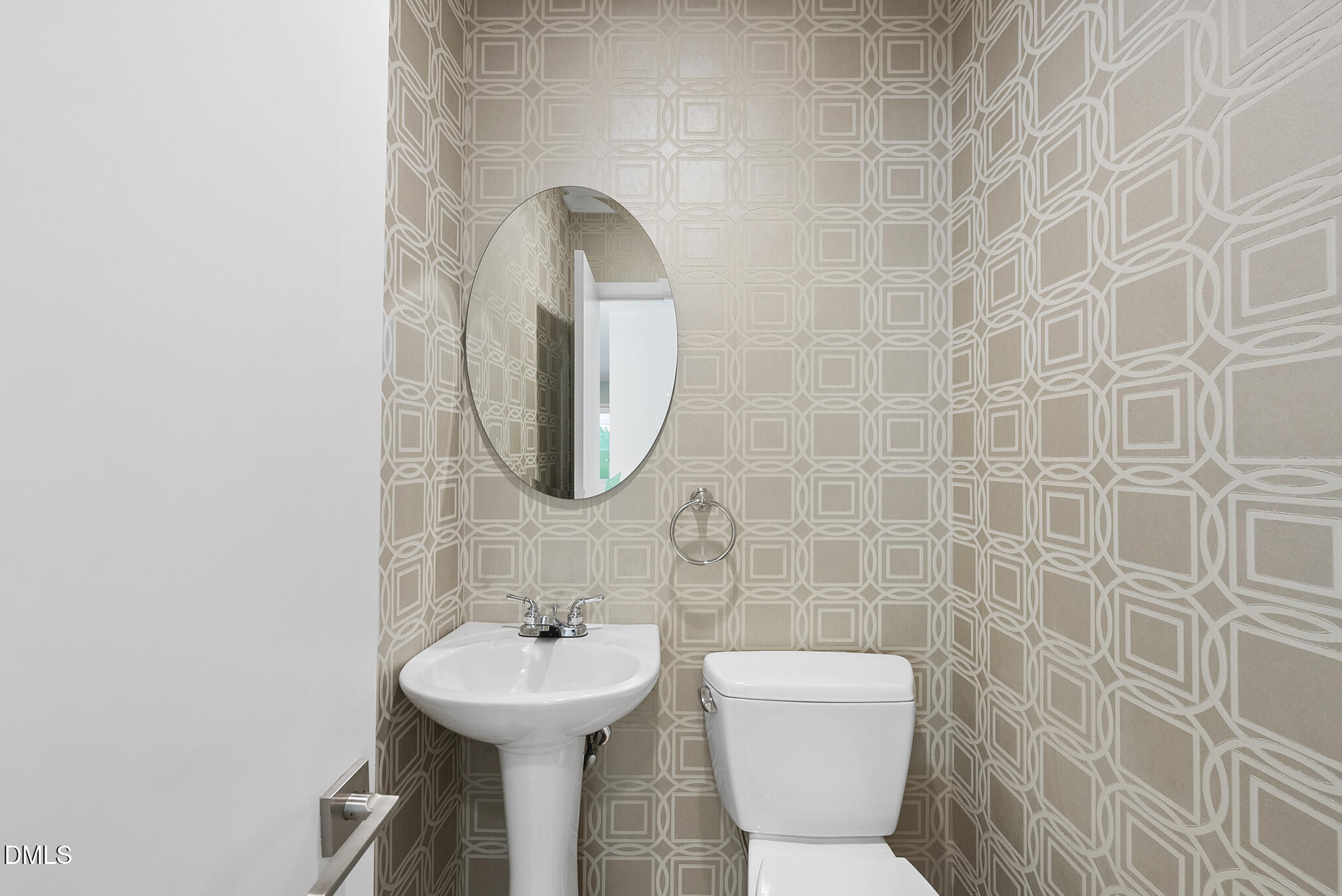 1605 Ridge Road Raleigh, NC 27607 - Photo 24 of 34 a bathroom with a toilet sink and mirror
