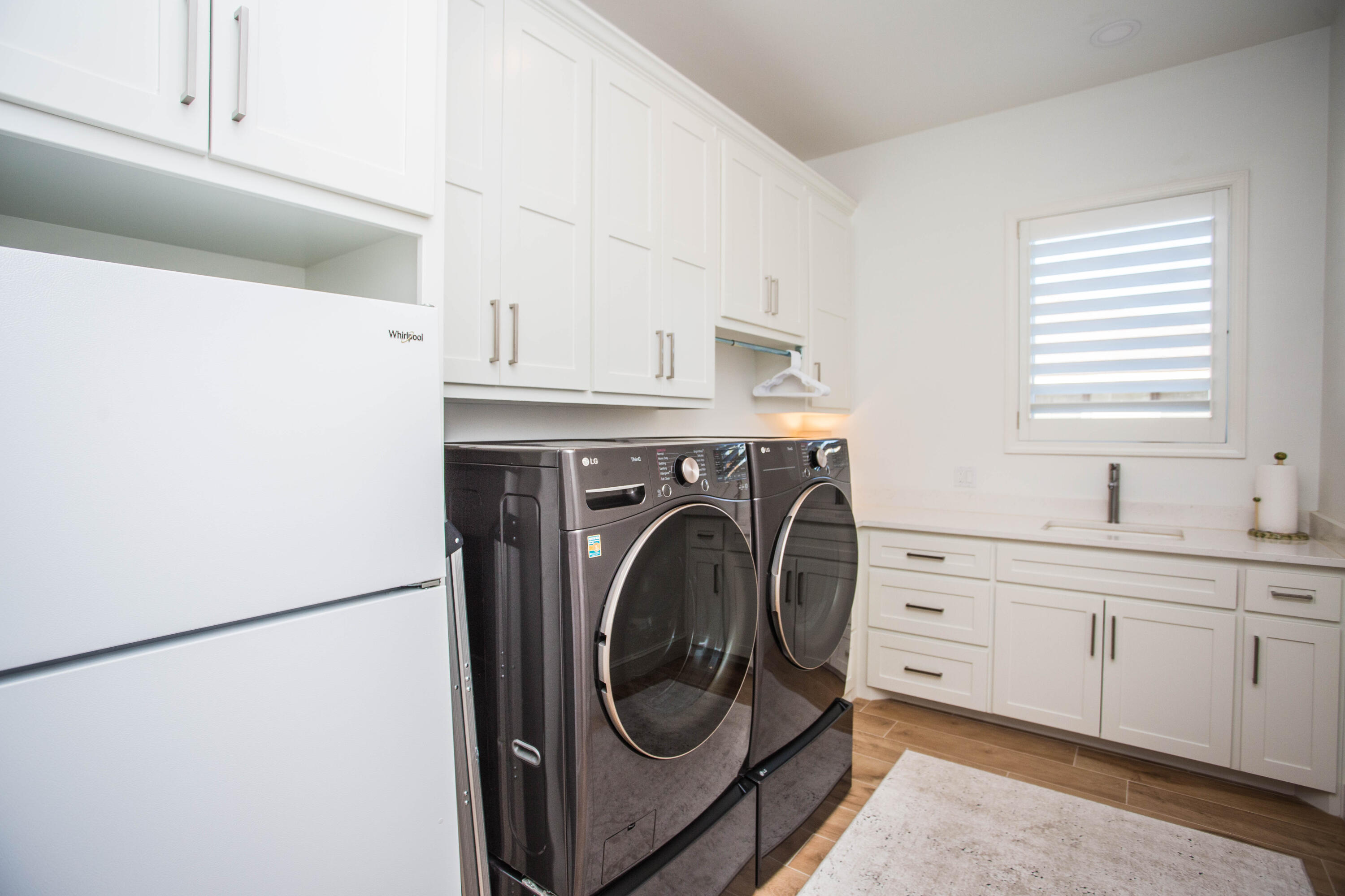 209 South Holliday Plainview, TX 79072 - Photo 21 of 29 a utility room with dryer and washer