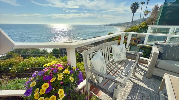 a view of balcony with furniture