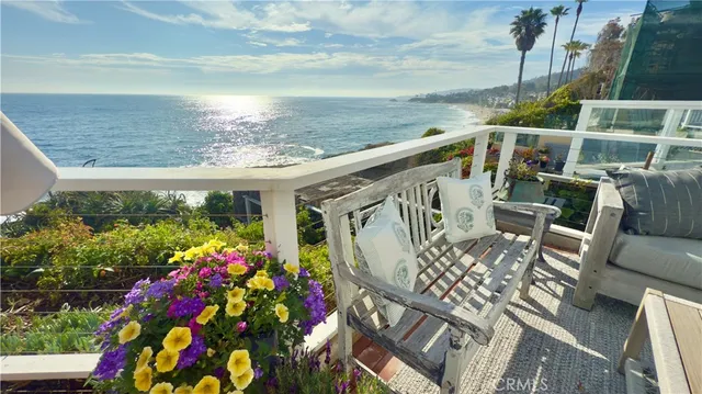 a view of balcony with furniture