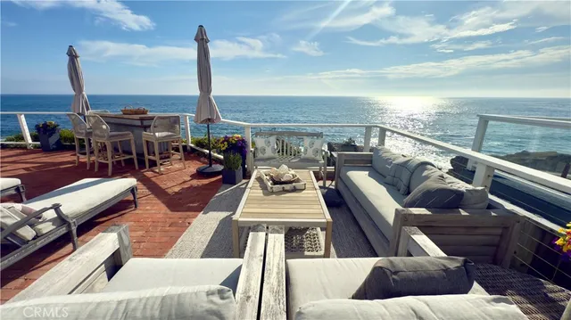 a view of a terrace with furniture