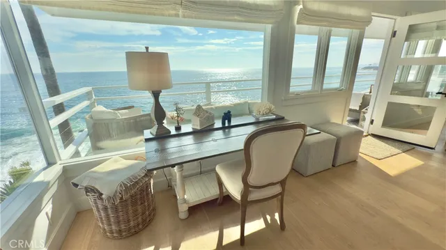 a room with furniture and a large window