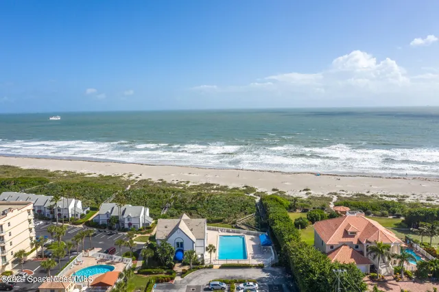 a view of a ocean with beach