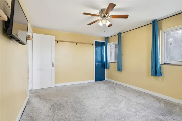 a view of a livingroom with wooden floor