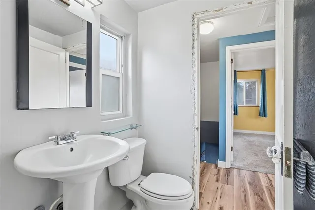 a view of a room with wooden walls