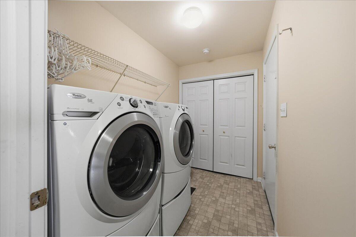 352 West 43rd Court Griffith, IN 46319 - Photo 16 of 19 a view of a hallway with washer and dryer