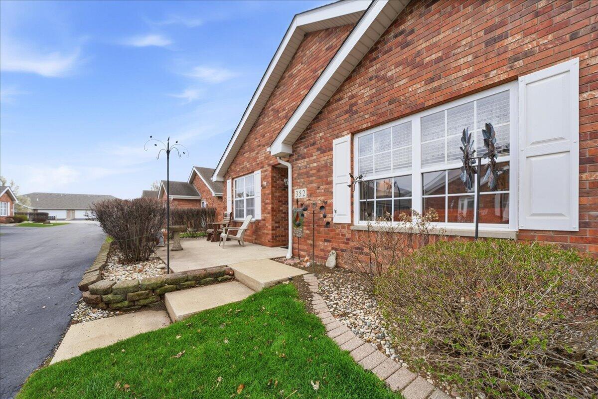 352 West 43rd Court Griffith, IN 46319 - Photo 18 of 19 a view of a house with backyard and sitting area