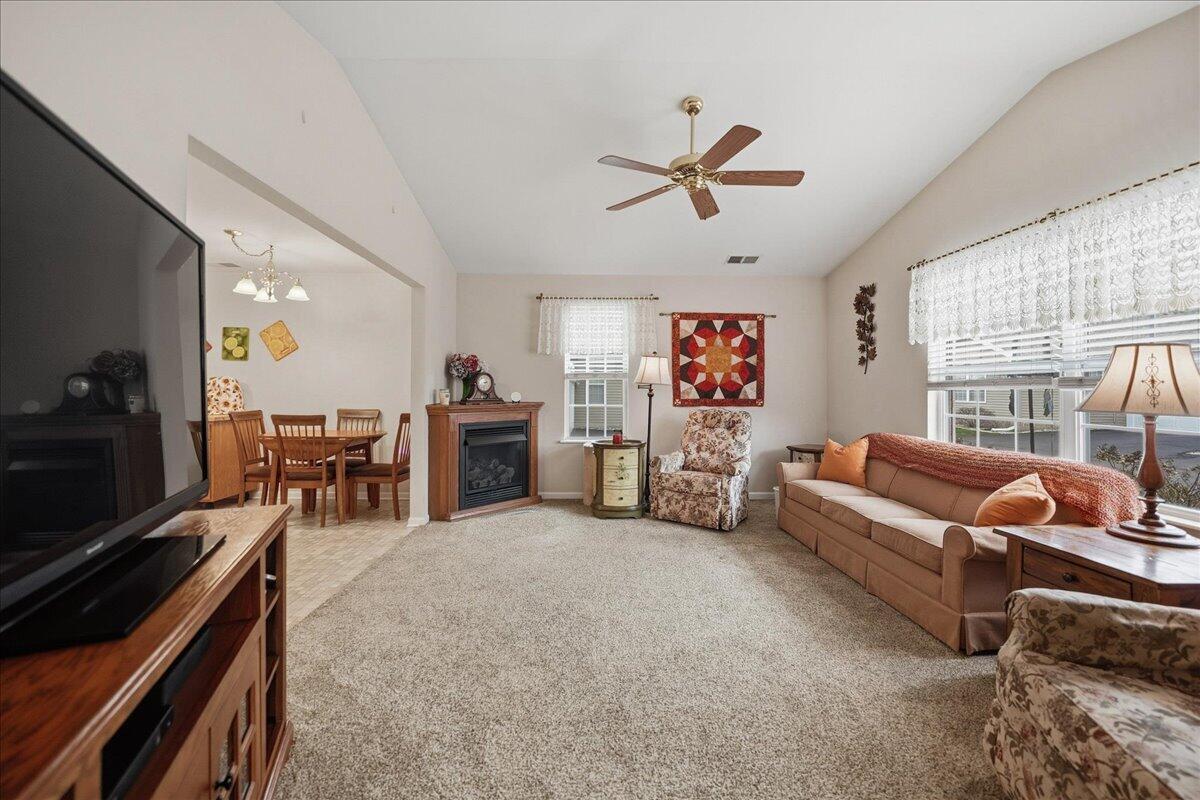352 West 43rd Court Griffith, IN 46319 - Photo 2 of 19 a living room with furniture and a flat screen tv