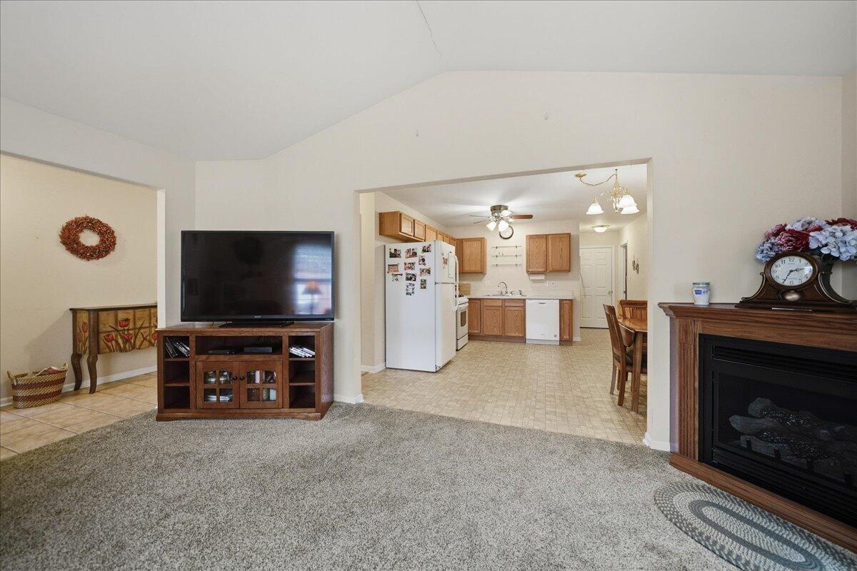 352 West 43rd Court Griffith, IN 46319 - Photo 5 of 19 a living room with furniture and a flat screen tv