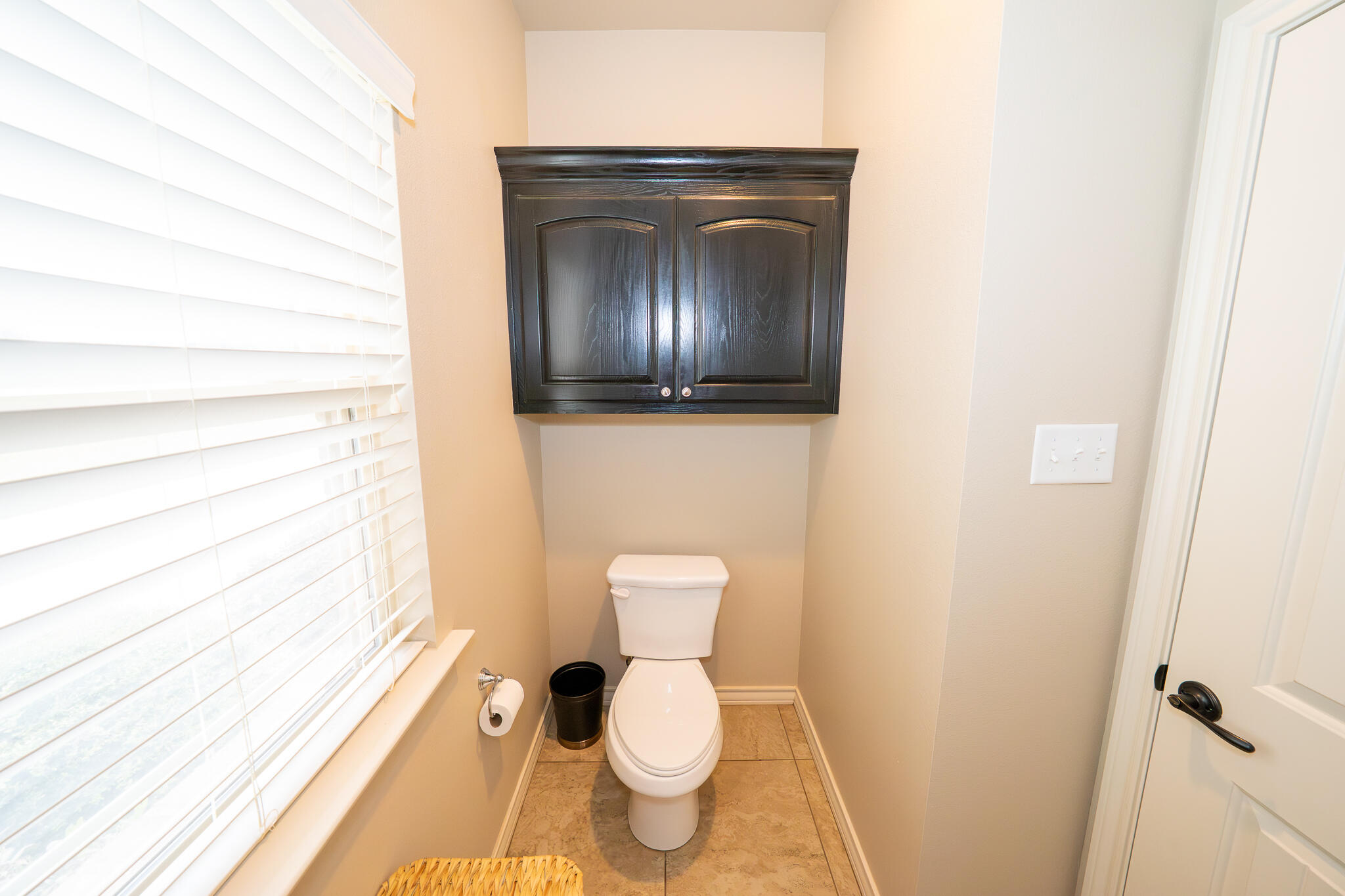 3301 County Road 7560 Lubbock, TX 79423 - Photo 30 of 40 a bathroom with a toilet and a sink