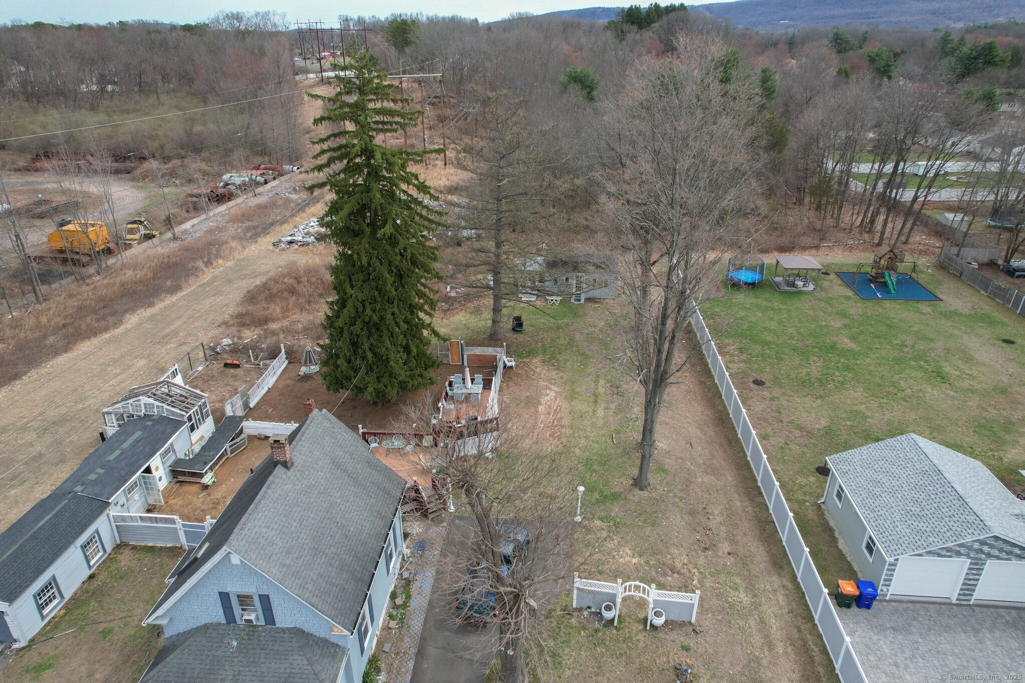 310 Buckland Street, Unit REAR Southington, CT 06479 - Photo 10 of 11 an aerial view of a house with a yard