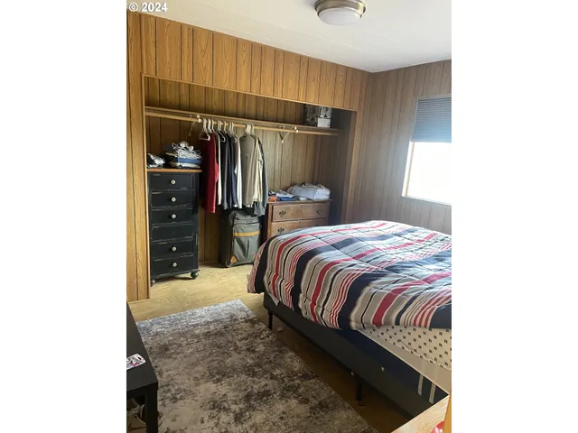 a sign broad on top of a wall