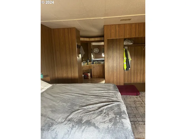 a bathroom with a tub and shower