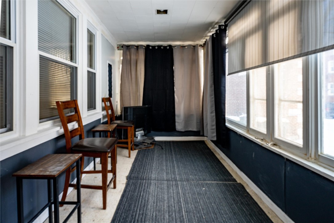 145 Devonshire Court Rochester, NY 14619 - Photo 15 of 39 Enclosed Front Porch