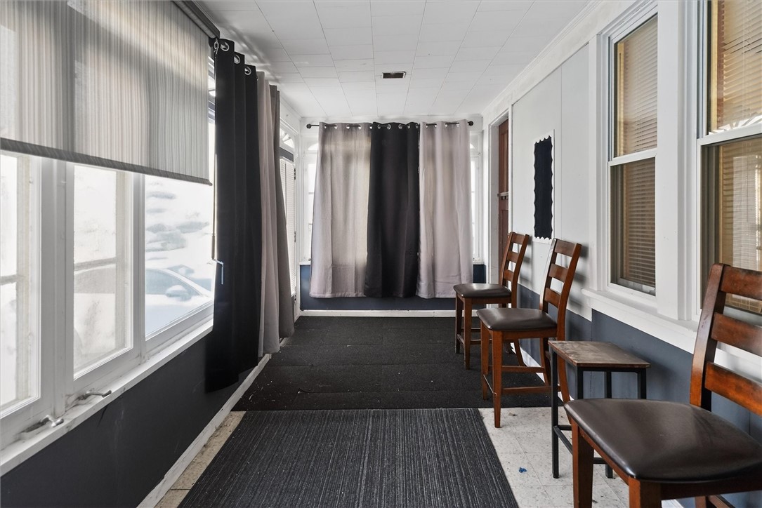 145 Devonshire Court Rochester, NY 14619 - Photo 16 of 39 Enclosed Front Porch