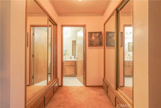 a view of a bathroom with a glass door
