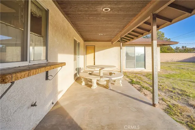 a view of a balcony with an outdoor space