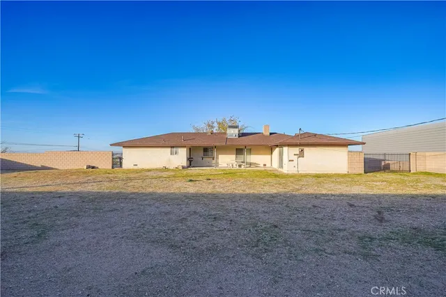 a view of a field with an ocean