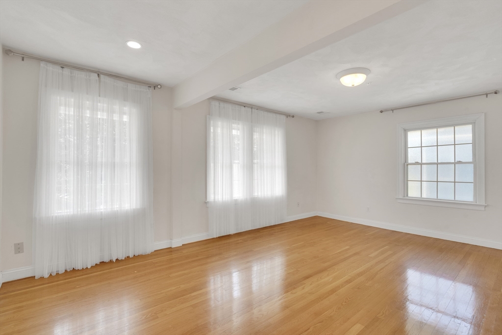 66 Webster Street, Unit 66 Newton, MA 02465 - Photo 19 of 40 a view of an empty room with a window