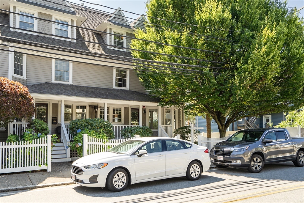 66 Webster Street, Unit 66 Newton, MA 02465 - Photo 3 of 40 a car parked in front of a house
