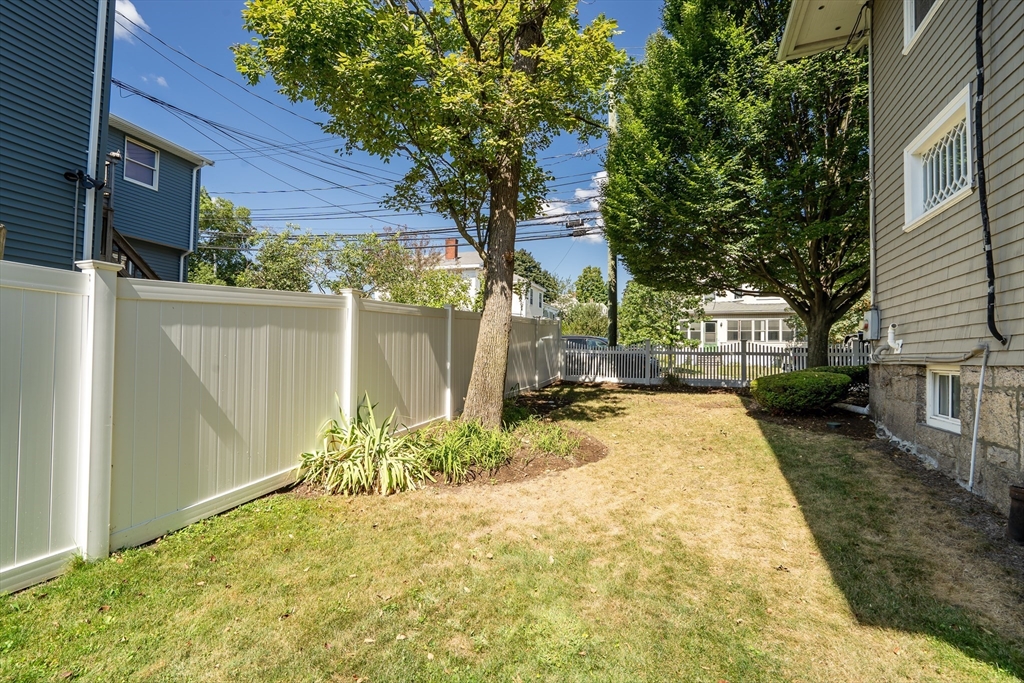66 Webster Street, Unit 66 Newton, MA 02465 - Photo 37 of 40 a view of a backyard of the house