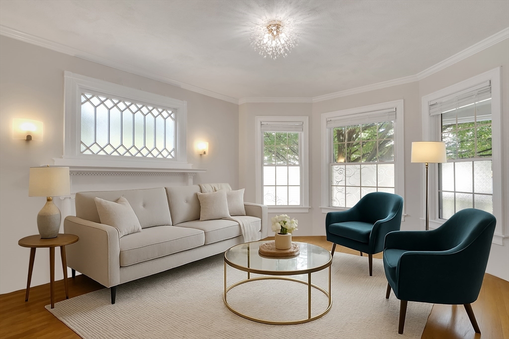 66 Webster Street, Unit 66 Newton, MA 02465 - Photo 4 of 40 a living room with furniture and a large window
