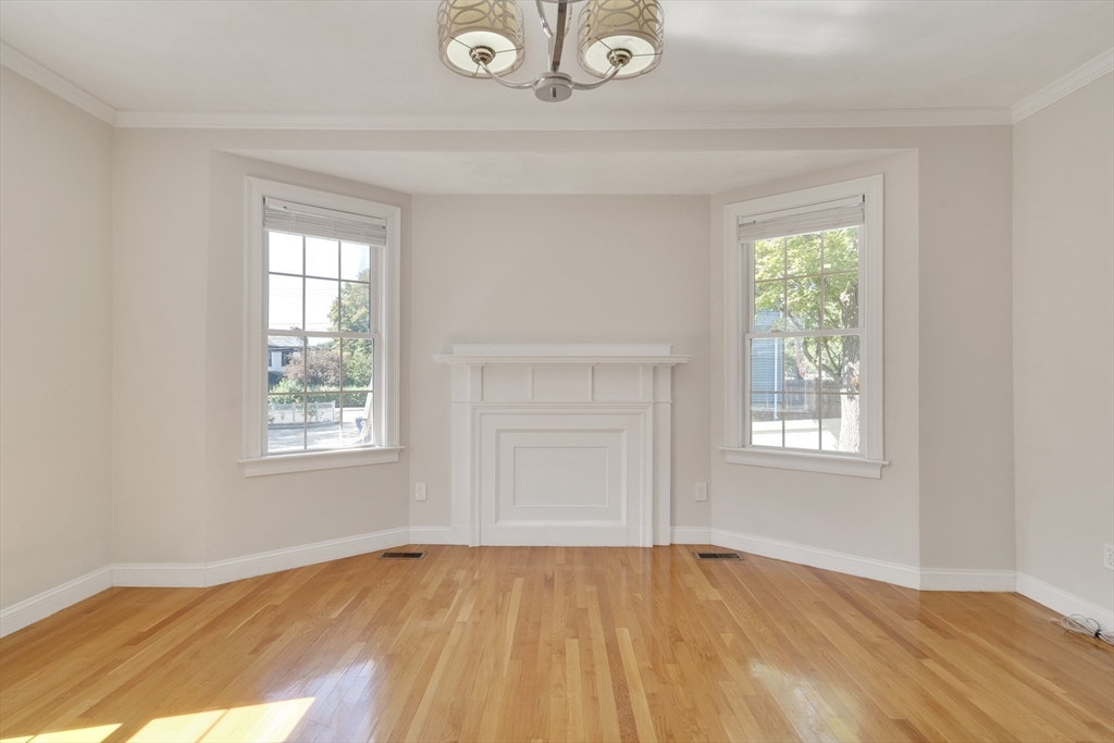 66 Webster Street, Unit 66 Newton, MA 02465 - Photo 10 of 40 an empty room with window