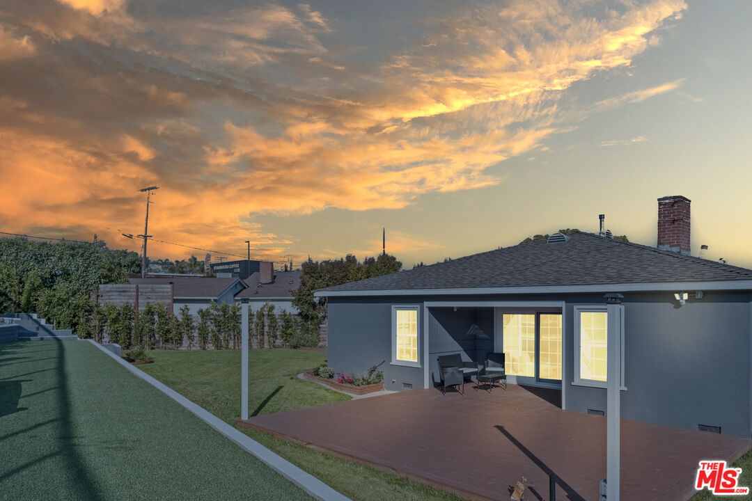 3500 Tuller Avenue Los Angeles, CA 90034 - Photo 11 of 20 a front view of a house with a garden