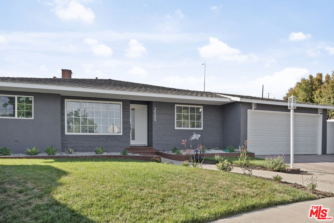 3500 Tuller Avenue Los Angeles, CA 90034 - Photo 20 of 20 a front view of a house with garden
