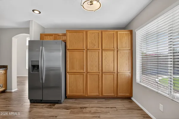 a kitchen with granite countertop a sink and a window