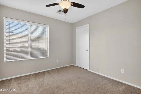 a view of an empty room with window