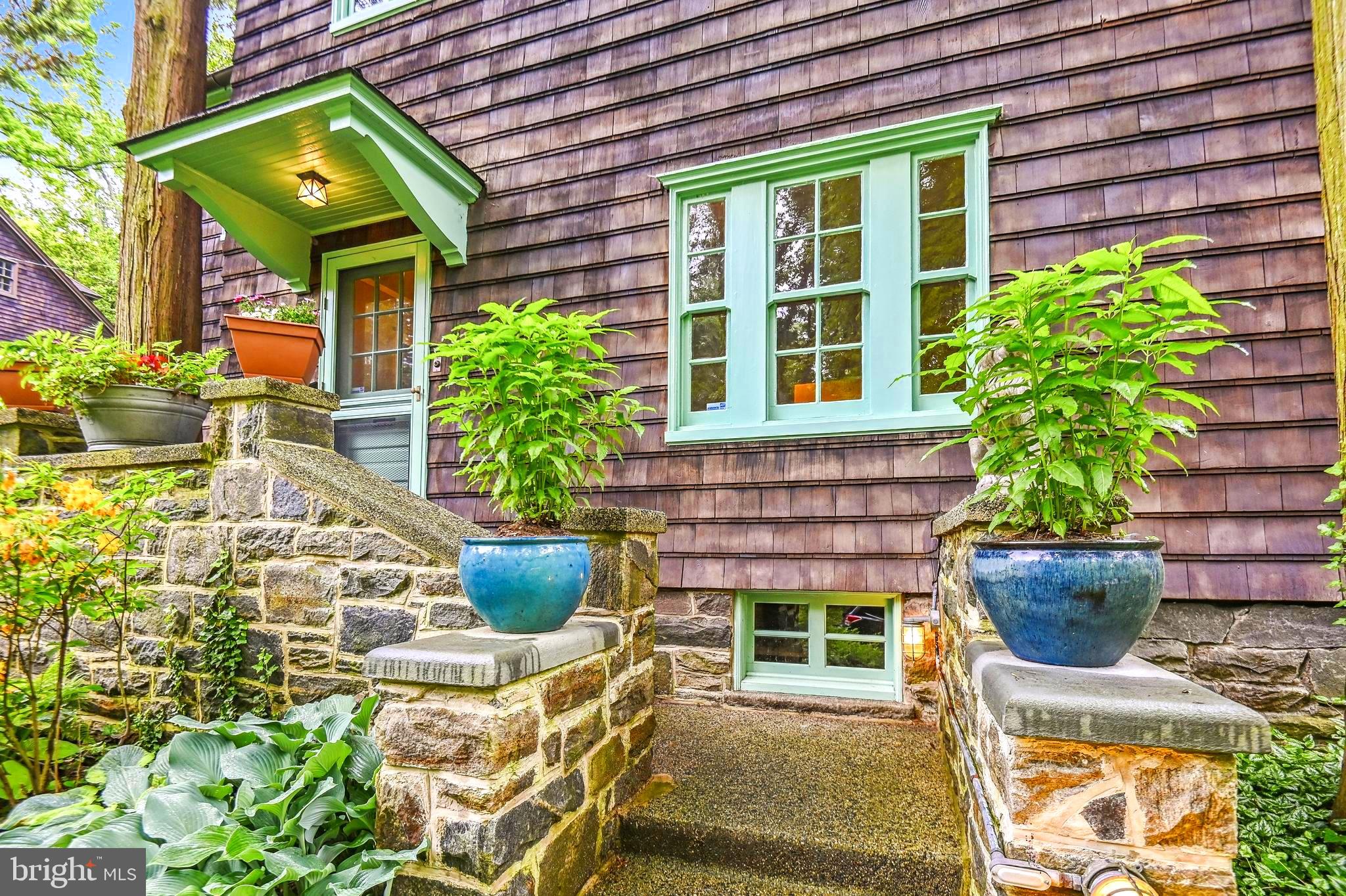 113 Deepdene Road Baltimore, MD 21210 - Photo 5 of 51 Beautiful stone to accompany the cedar shingle.