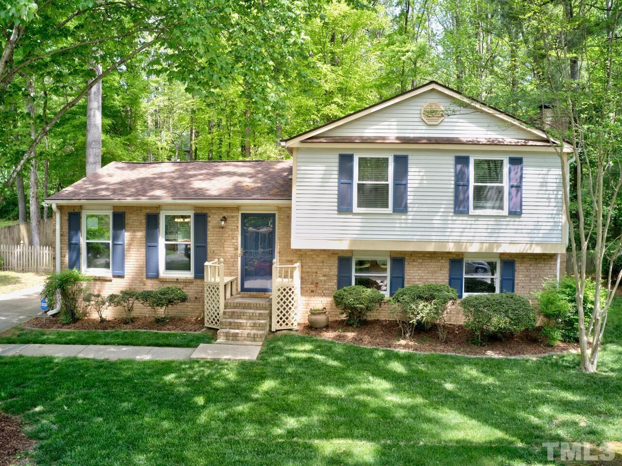7249 Mine Shaft Road Raleigh, NC 27615 - Photo 38 of 45 a front view of a house with garden