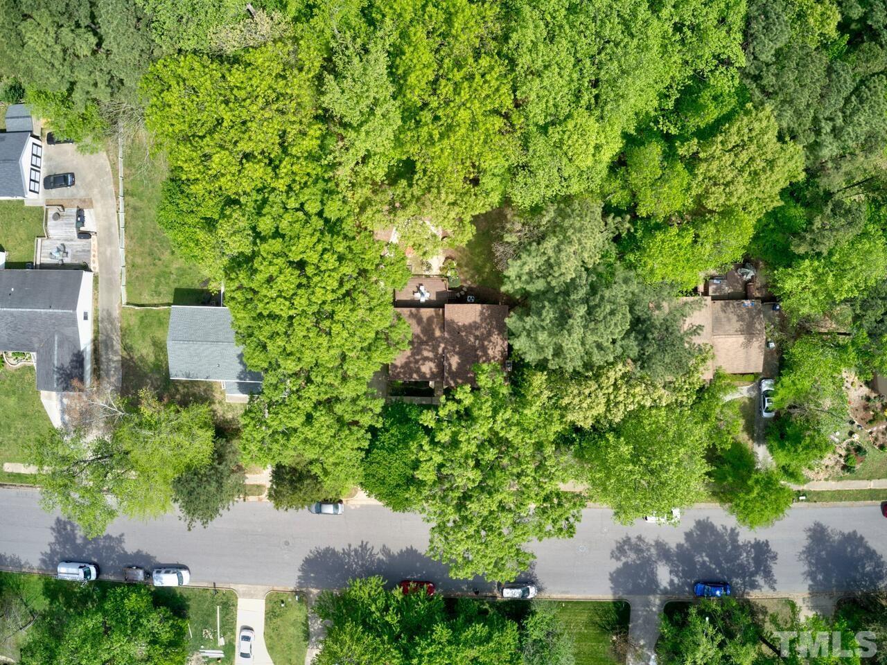 7249 Mine Shaft Road Raleigh, NC 27615 - Photo 40 of 45 an aerial view of a house with swimming pool and garden