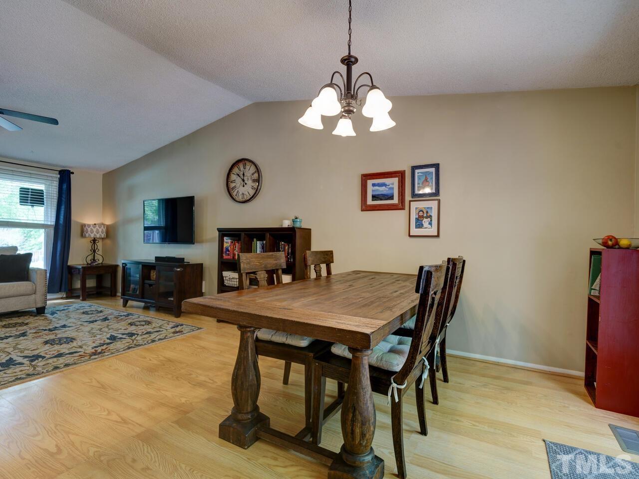 7249 Mine Shaft Road Raleigh, NC 27615 - Photo 10 of 45 a view of a dining room with furniture