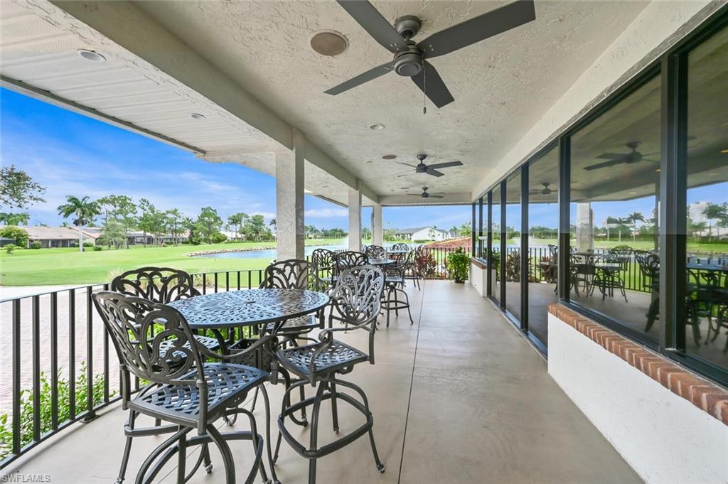 492 Veranda Way, Unit E105 Naples, FL 34104 - Photo 27 of 34 a view of a dining room with furniture window and outside view
