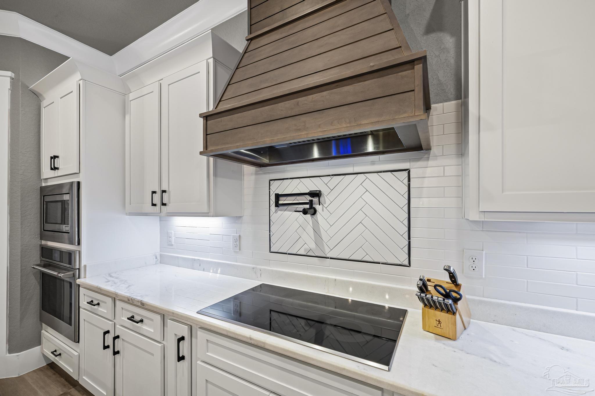8415 Beulah Road Pensacola, FL 32526 - Photo 15 of 59 a kitchen with stainless steel appliances cabinets and a window