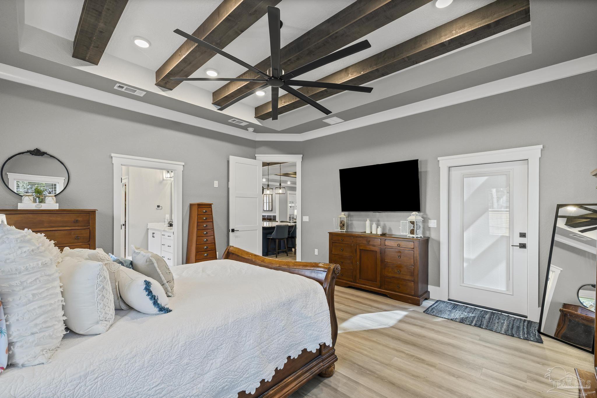 8415 Beulah Road Pensacola, FL 32526 - Photo 20 of 59 a bedroom with a bed and a flat screen tv