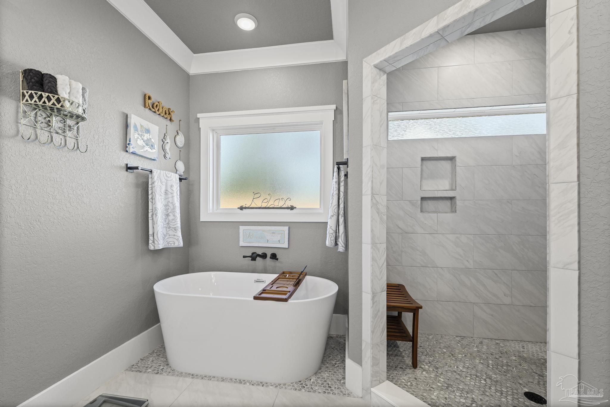 8415 Beulah Road Pensacola, FL 32526 - Photo 21 of 59 a bathroom with a bathtub and a shower