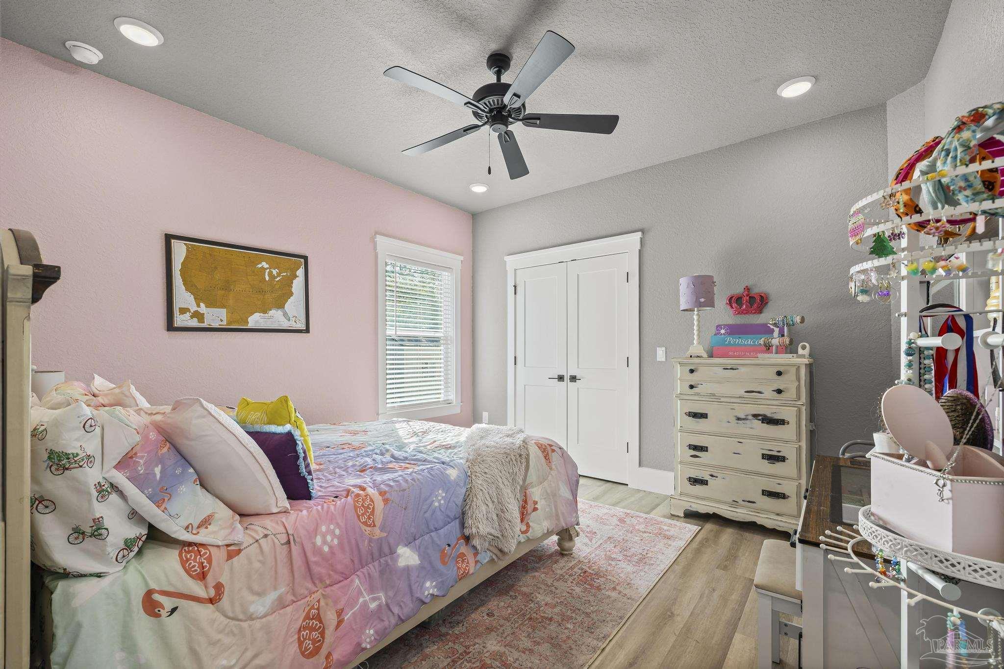 8415 Beulah Road Pensacola, FL 32526 - Photo 30 of 59 a bedroom with a bed and furniture