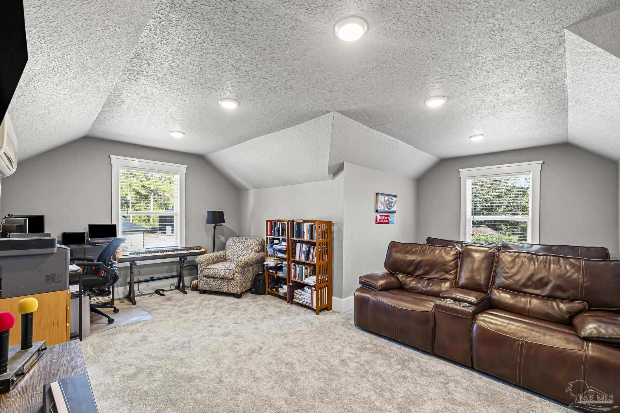 8415 Beulah Road Pensacola, FL 32526 - Photo 36 of 59 a living room with furniture and a window