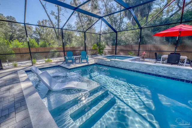 a view of a backyard with a deck