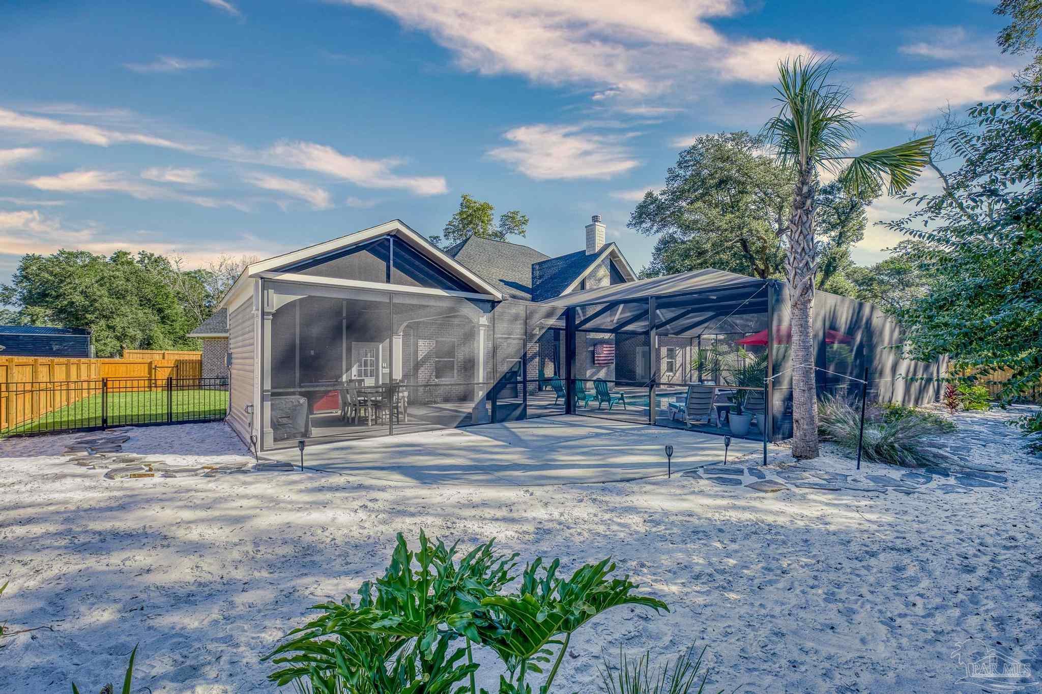 8415 Beulah Road Pensacola, FL 32526 - Photo 49 of 59 a view of a house with a yard and pathway