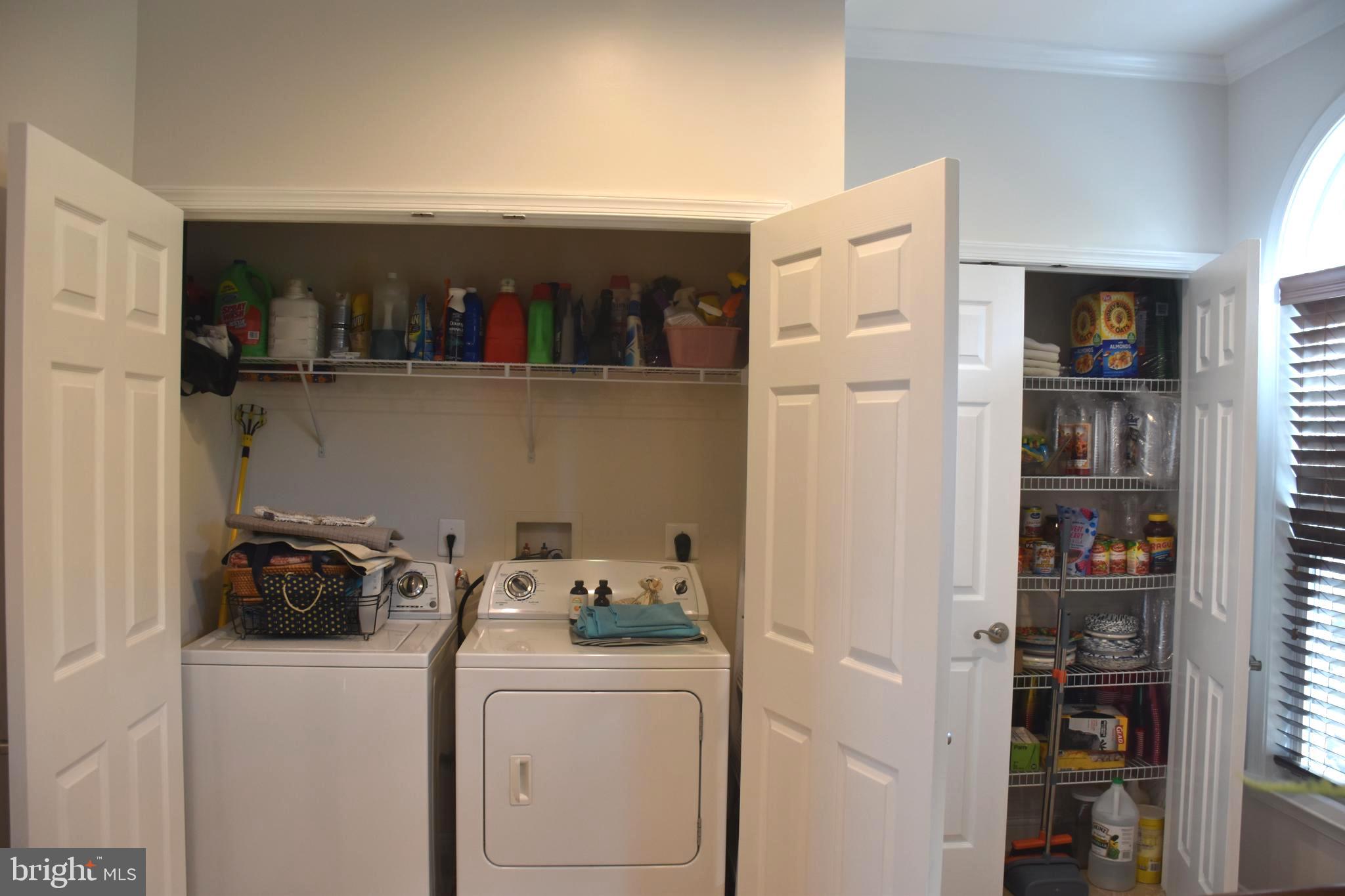 803 Ryan Street Baltimore, MD 21230 - Photo 17 of 41 a view of storage and utility room with washer and dryer