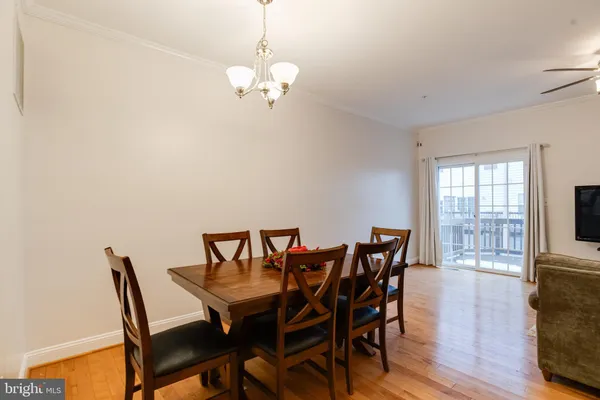 a kitchen with stainless steel appliances kitchen island granite countertop a sink and cabinets