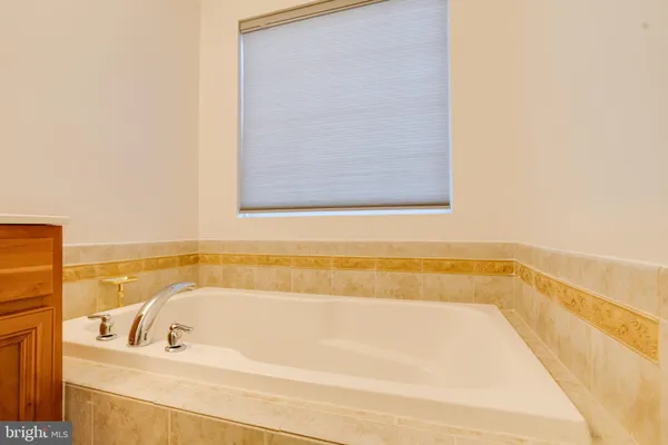 a front view of a house with a garage